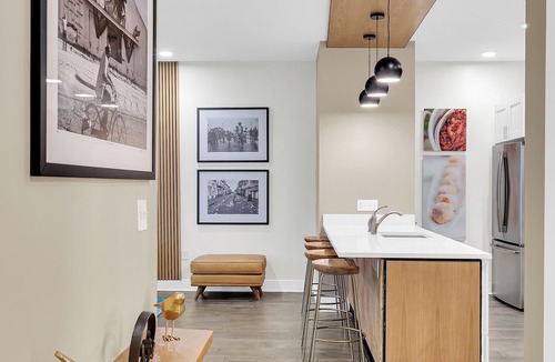 New Orleans Apartment | Modern 2BR Bywater condo with 2 king beds, pool & gym. Balcony, parking, near French Quarter.