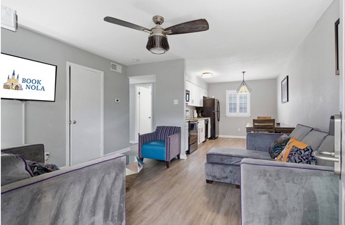 Faubourg Marigny Apartment | Modern 2BR near Frenchmen Street with shared pool, hot tub, and easy walk to the French Quarter.