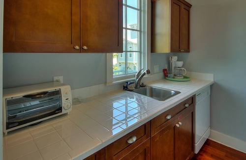 West Panama City Beach Apartment | Moreland Carriage House - Close to Beach & Playground! Free Bikes/Fitness/Tennis