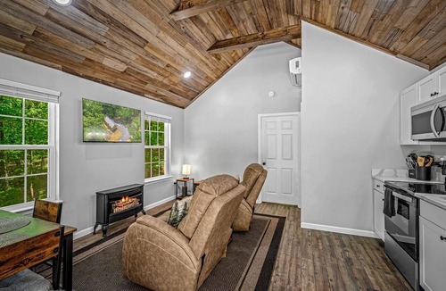 Fort Payne Cabin | Mountain Cabin with Fire Pit & Forest View Porch in Fort Payne, Alabama
