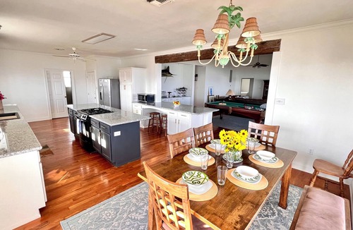 Grand Isle House | My ReWard Sunset House has a 450’ pier with boat slips, crabbing, fishing, swim