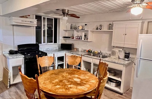 Grand Isle House | My ReWard Sunset House has a 450’ pier with boat slips, crabbing, fishing, swim