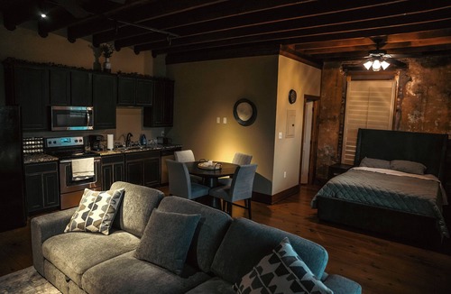 Sulphur Springs Apartment | Nestled in the buzzing heart of Sulphur Springs, White Oak Hotel isn't just a place to stay-it's an invitation to immerse yourself in a vibrant tapestry of creativity, flavor, and untamed beauty. Our intimate three-room retreat, born from historic bo