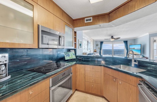 Seawinds Condo Condo | NEW Listing! Direct Oceanfront 2/2 | Private Balcony | Heated Pool & Garage Parking