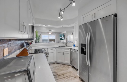 Seawinds Condo Condo | NEW listing! Direct Oceanfront 2/2 | Fully Updated | Heated Pool & Garage Parking
