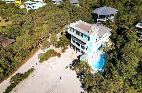 North Captiva House | NEW LISTING! OCEAN PARADISE: BEACHFRONT, SLEEPS 12, 2 CARTS, POOL, GAMES, & FUN