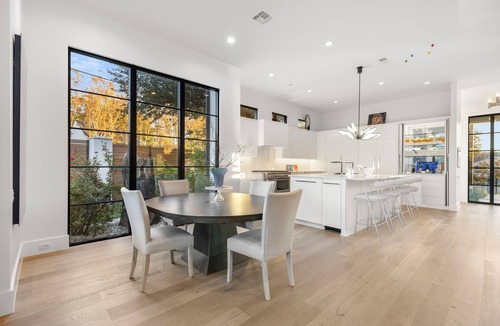 Northwest Dallas House | New luxury modern home in Midway Hollow with heated pool, private casita, indoor/outdoor living, designer furnishings, garage, and concierge service. Perfect for families, groups, or extended stays.
