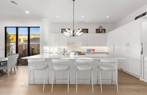 Northwest Dallas House | New luxury modern home in Midway Hollow with heated pool, private casita, indoor/outdoor living, designer furnishings, garage, and concierge service. Perfect for families, groups, or extended stays.