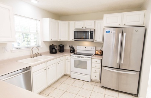 Gulfview Heights House | New to Dune Allen Realty! 10-min walk or 2-minute golf cart ride away to beach!