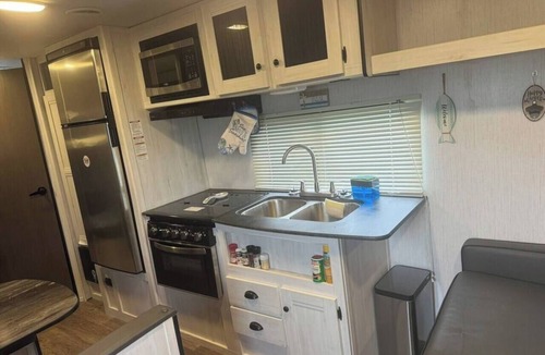 Holly Beach House | Nice RV with AC in charming Holly Beach steps from the beach