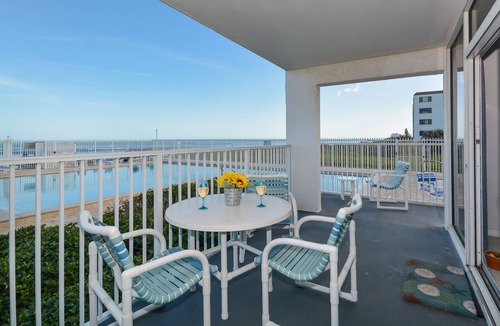 Bethune Beach Condo | Ocean Condo 104 ~ Ground Floor Corner Condo with wrap around balcony! Walk right out to Pool!