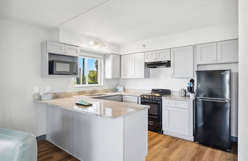 Fort Bay House | Ocean/Gulf View Beach Walkup Emerald Suite at Sugar Sands Beachfront Hotel