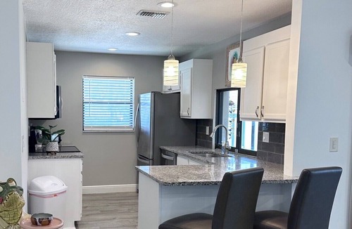 Bella Vista Condo | One level villa. Clubhouse, pool, tennis. Barbeque on patio. Two parking spaces.