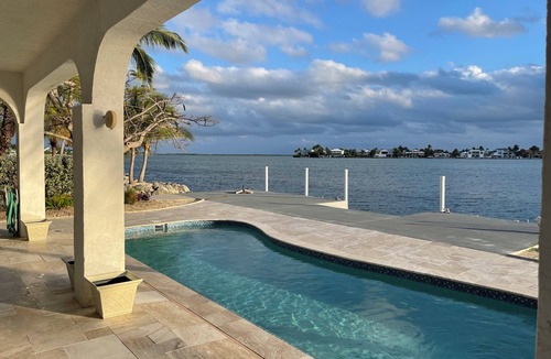 Sugarloaf Shores House | Open Water Views, Sunsets and 2 New Beautiful Pools Create Your Island Oasis