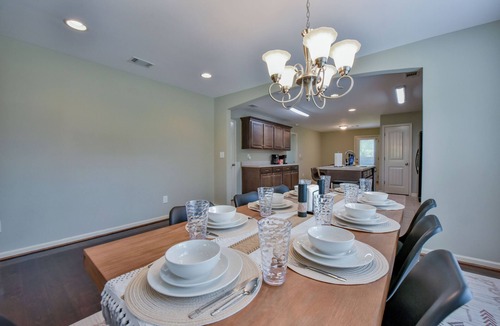 Northport House | Overtime Outpost-Book for football season and more! Fenced in back-yard!