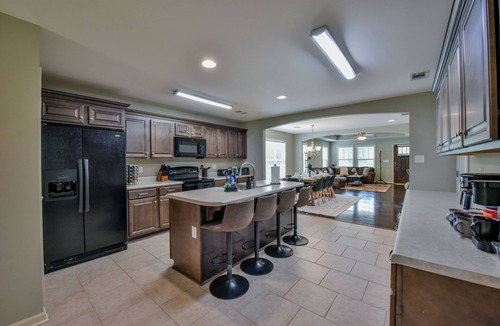 Northport House | Overtime Outpost-Book for football season and more! Fenced in back-yard!
