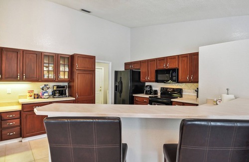 Palm Coast Cottage | Palm Coast Escape: Screened Lanai, Saltwater Pool!