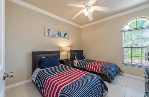 Palm River Estates Villa | Palms and Pool home in Naples best beaches and national parks