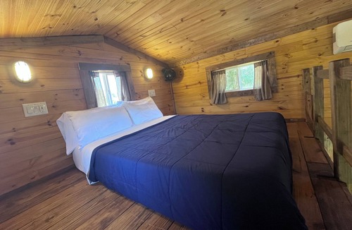 Denison Cabin | Pardon our dust as we work to reopen this charming resort on Lake Texoma!