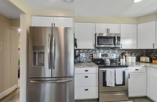 Port Charlotte House | Peaceful Canal-Front Retreat Pool, Kayaks, Bikes & Sunrise Views
