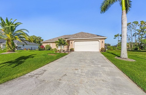Trafalgar House | Peaceful fresh water canal home with heated pool. Incredible Value.