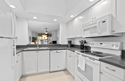 Trailer Estates Condo | Peaceful Lakeview Condo 2 Pools Minutes to IMG & Beaches