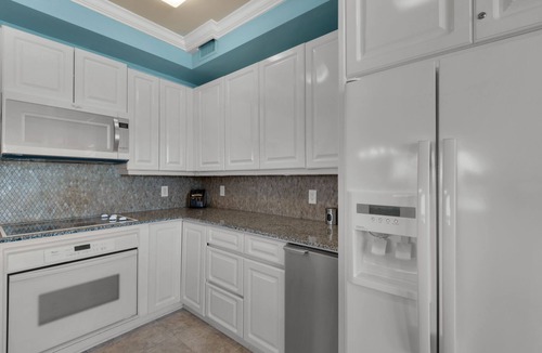 Navarre Beach Condo | PENTHOUSE - TOP FLOOR - BEACHFRONT & CHAIRS - POOL - BALCONY - GYM-NEW ELEVATORS