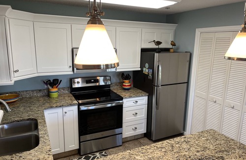 Gulf Place Condo | Perfect Beach Getaway! 2 BR 2 BA Ground floor End Unit! Steps From The Beach!