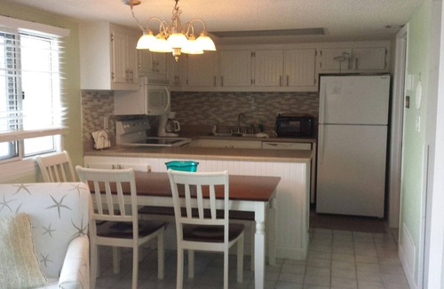 Sunnyside Condo | Perfect Spot for a Well Deserved Vacation! Check Us Out!