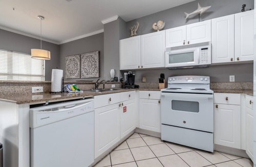 Frangista Beach Condo | Pet Friendly! 3rd floor overlooks pool, private beach access, hot tub