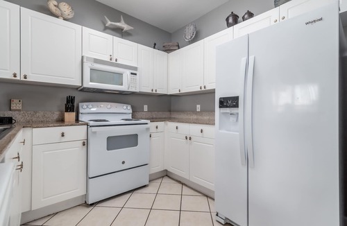 Frangista Beach Condo | Pet Friendly! 3rd floor overlooks pool, private beach access, hot tub