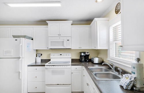 Lower Grand Lagoon Condo | 🐶Pet Friendly~ 66ft from Beach Access~ Complex Pool~ 2BR Gulfside Condos #3