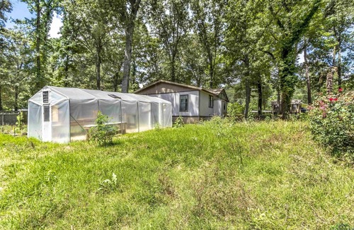 Ore City House | Pet-friendly campground cabin retreat w/shared pool, firepit, lake access