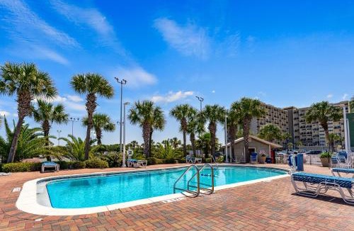 Sunnyside House | Pinnacle Port #115A by Book That Condo