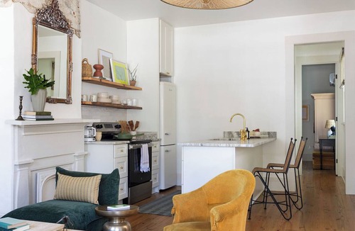 Lower Garden District Apartment | Porch Life and Local Nola Magic in a Newly Renovated Space!
