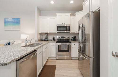 Thomas Drive House | Pride of PCB | 3BR Townhome, Pool Access, Patio, Near Beach, Sleeps 10