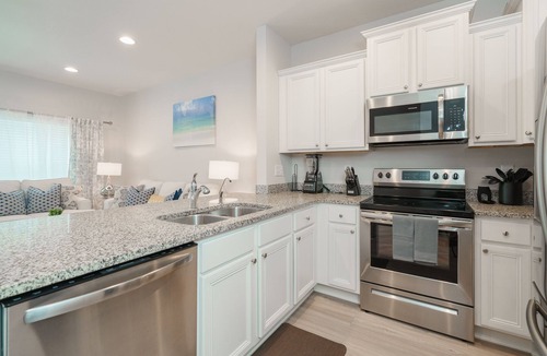 Thomas Drive House | Pride of PCB | 3BR Townhome, Pool Access, Patio, Near Beach, Sleeps 10