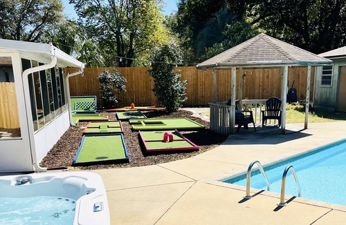 Pensacola House | Private 4-bed/3 bath house with putt-putt golf, heated pool, and hot tub.
