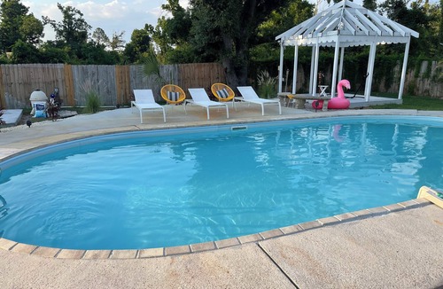 Pretty Bayou House | Private Bungalow with pool across the street from bay! 5 min drive to the beach.