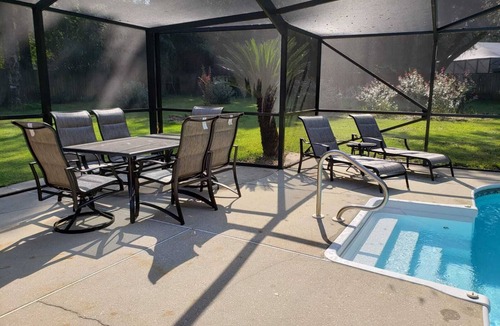 North Northwest Pensacola House | Private Getaway with Screened Pool, Upscale Kitchen, & Large Private Fenced Yard