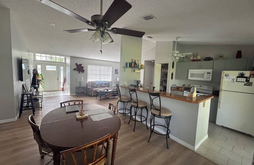 Gardens of Gulf Cove House | Private home, great sunsets over pristine canal. 10 mins to beaches