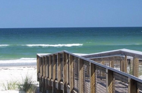 Apalachicola House | Private King Room with outdoor entrance, deck, and private bathroom.