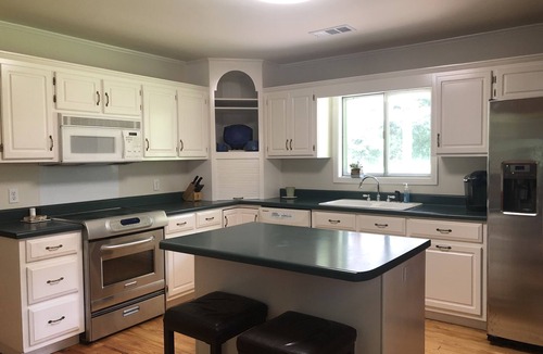 University Hills House | Quiet Home less than a mile from Vaught Hemingway