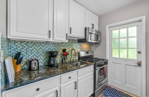 Highland Park Delray Villa | Red Palm Villas: The Saw Palmetto