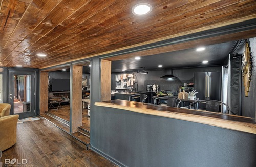 Jefferson Cabin | Relax and unwind at The Whiskey Barrel, a cozy waterfront retreat designed for fun and laid-back lake living. Soak in your private hot tub, paddle out with the kayaks, or spend the afternoon on one of the 4 decks reading a good book