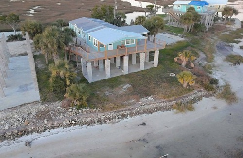 Salem House | Relax at Dark Island Gulf Retreat in this 4-bedroom house in Perry FL