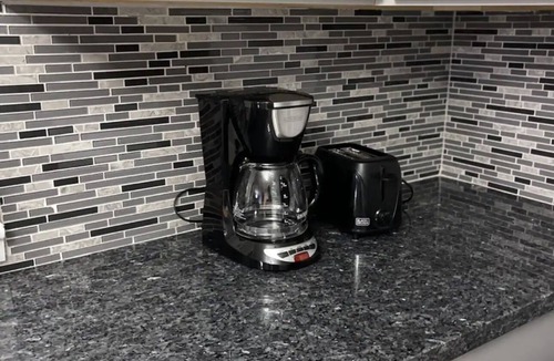 Orange House | Relax with your family in this newly renovated home away from home.