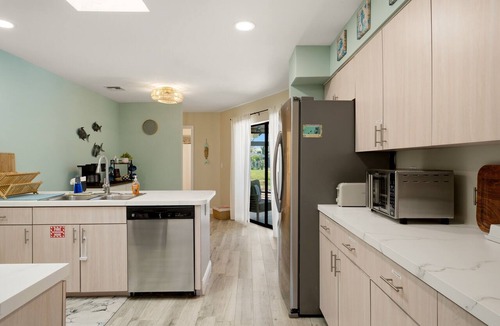 Pebble Beach House | Relaxing canal retreat near Manasota Key w/private pool and outdoor TV!