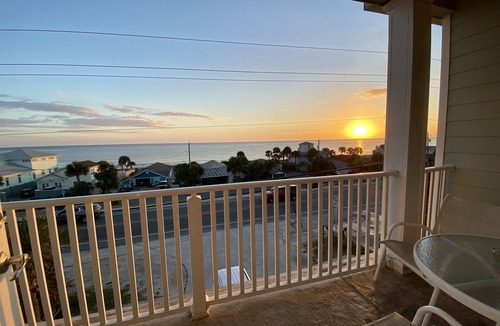 Bahama Beach Condo | Remodeled 3 BR/2BA condo steps to the beach! Sunset views and private garage.