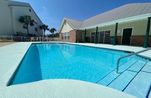 Indian Bayou Apartment | Seaside Serenity Near Beach with Pool, Gym, Balcony